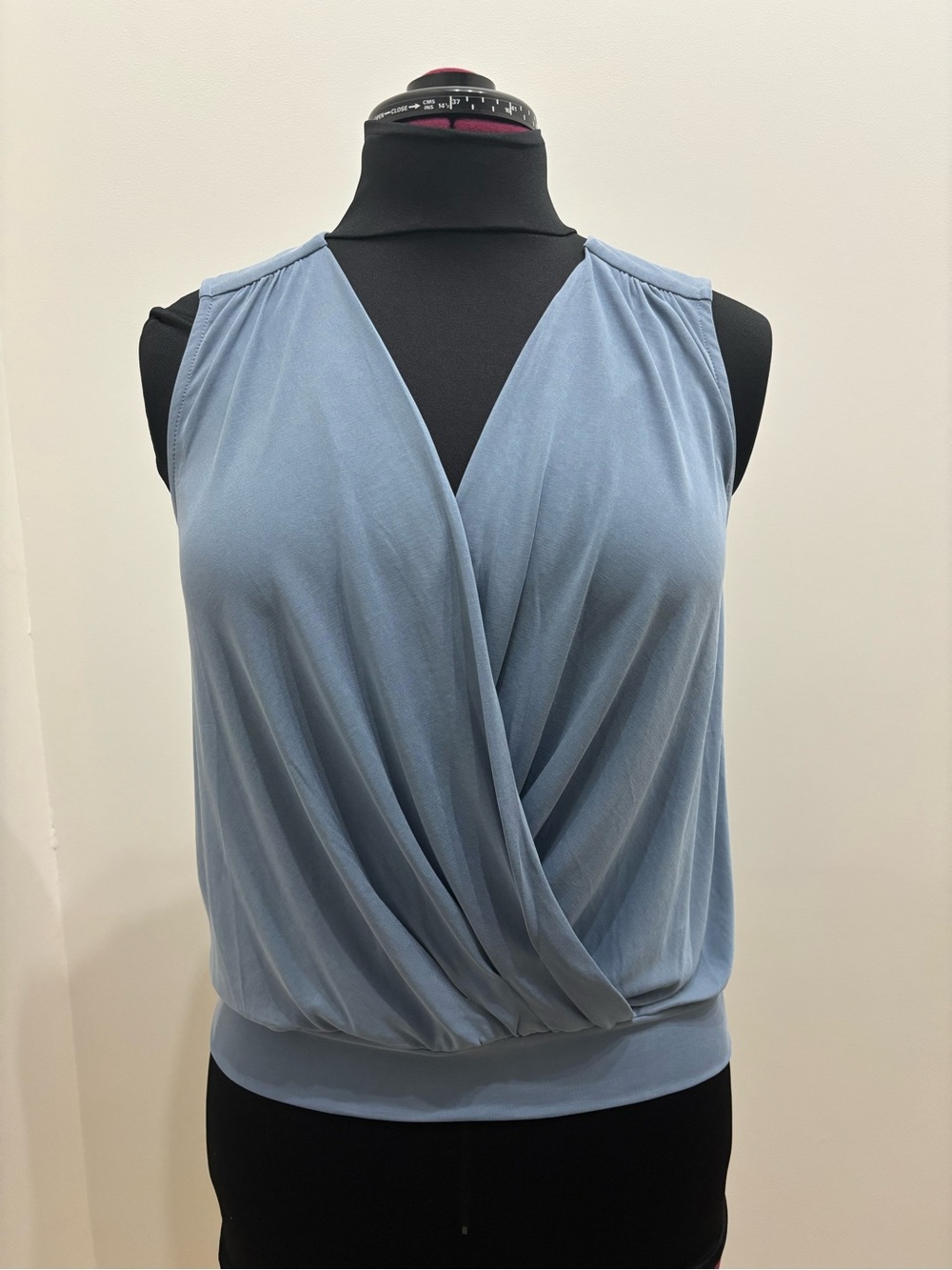 MYSTREE Blue Sleeveless Plunge V-Neck Banded Waist Top